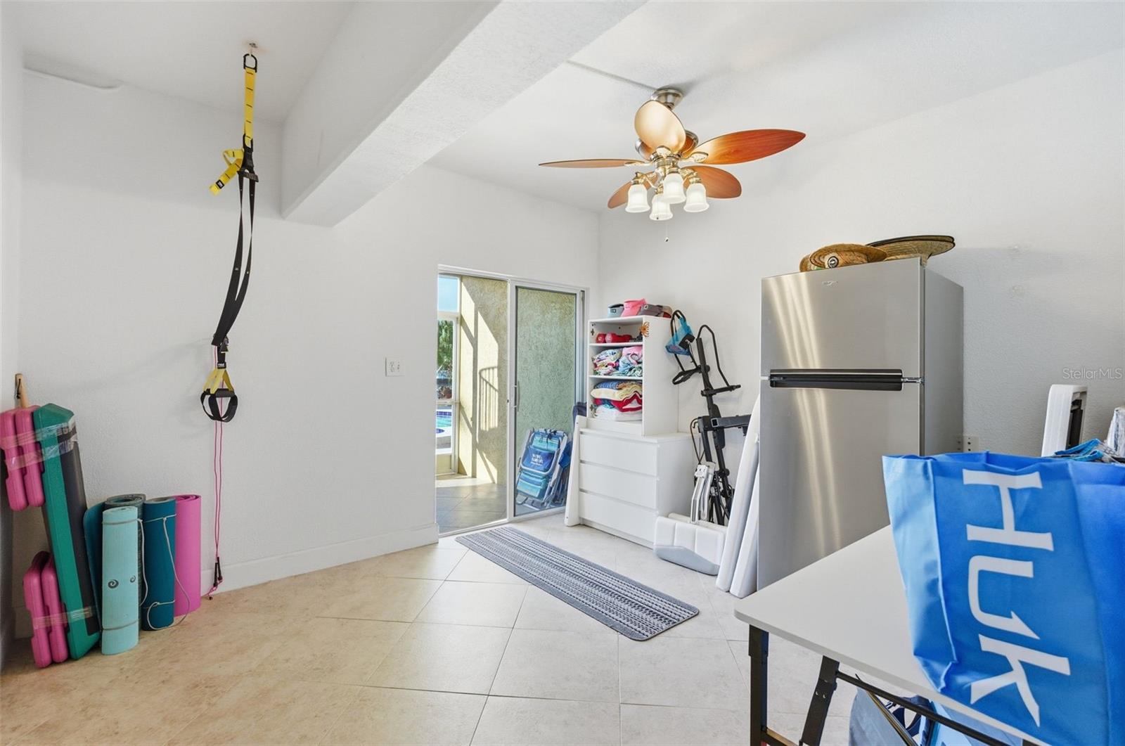 Air conditioned bonus room behind the garage.
