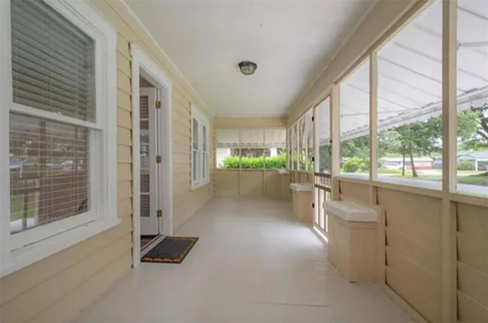 Large front screened-in porch.