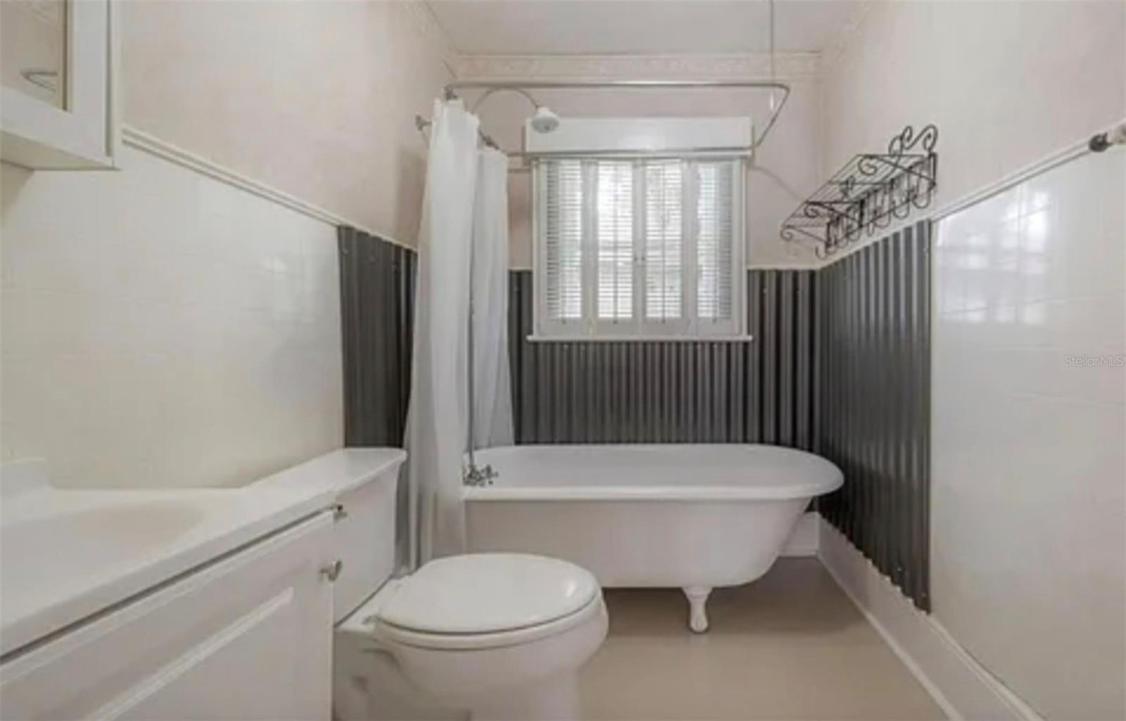 Garden tub in good sized master bathroom.