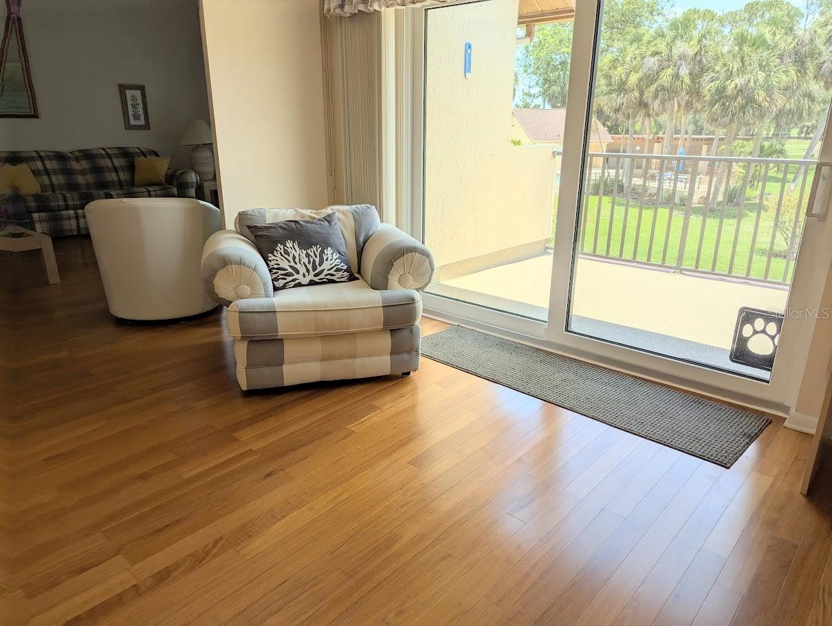 Den with access to deck