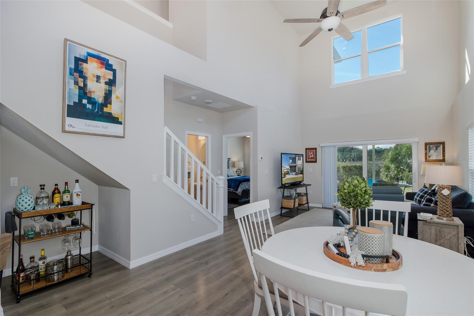 View of dining and living areas from front of home