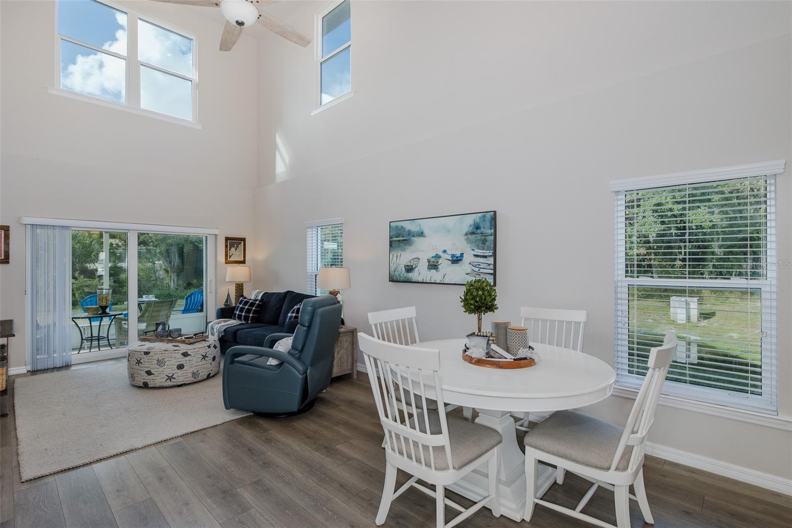 Light and airy cathedral ceilings in dining/living room
