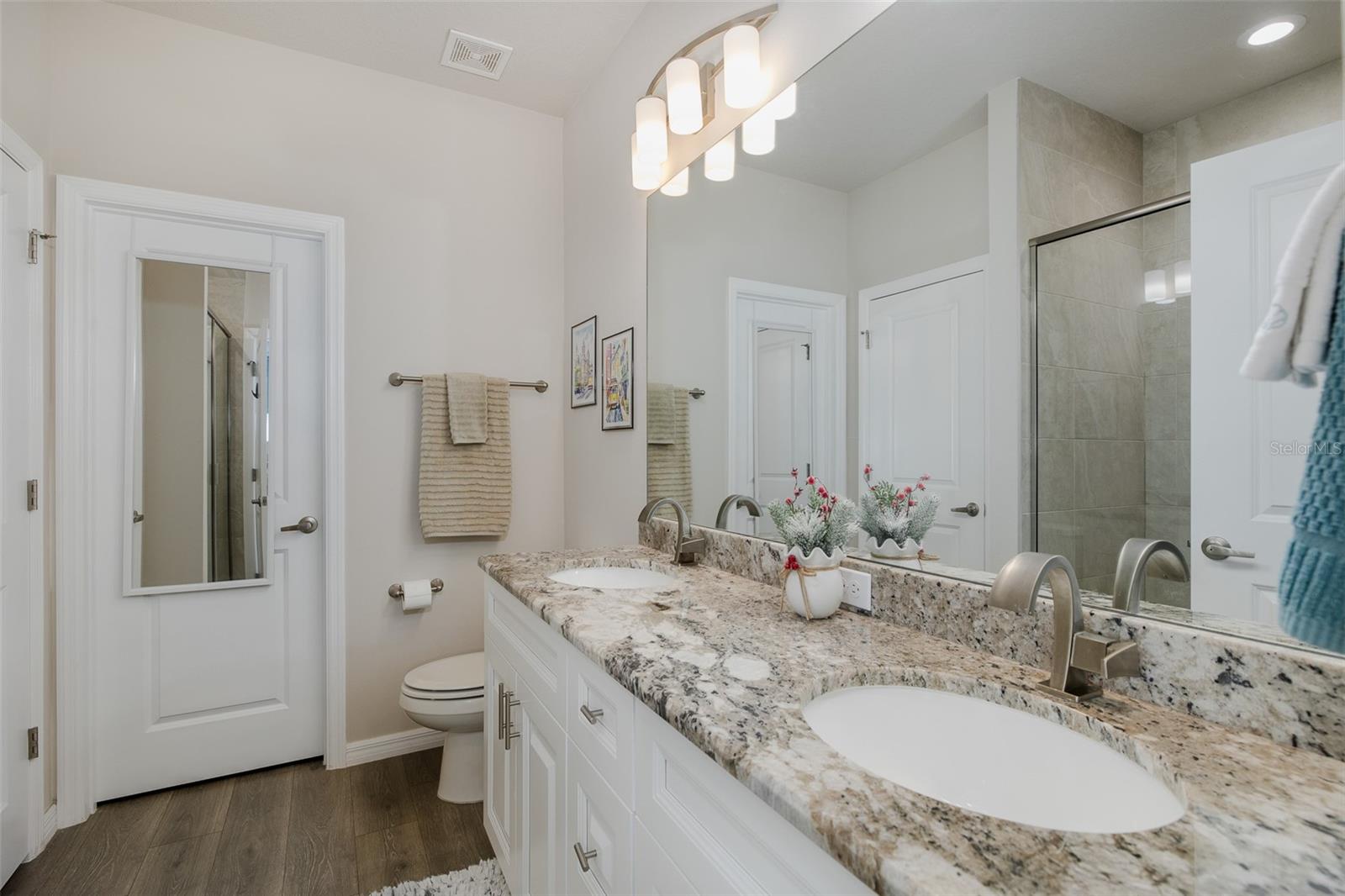 Double sink with upgraded granite and two closets