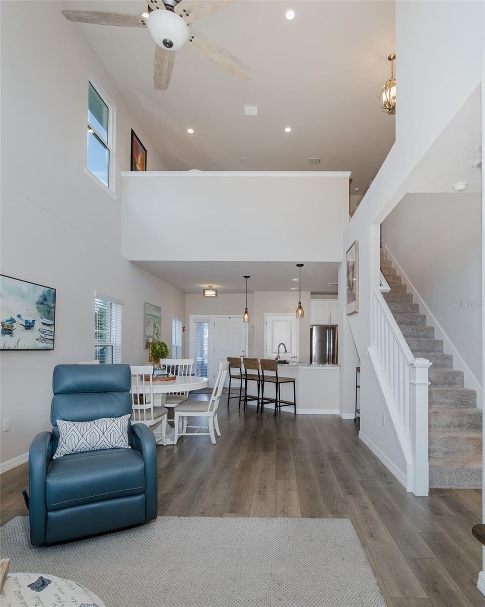 Open staircase to large loft and upstairs bedrooms and bathroom