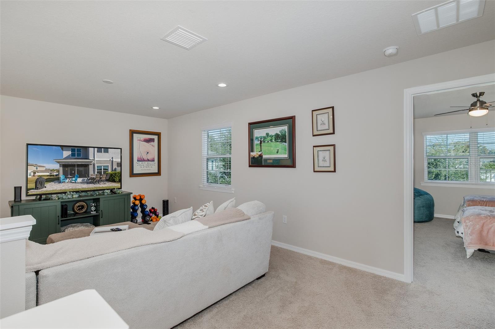 Third bedroom in front of house from loft