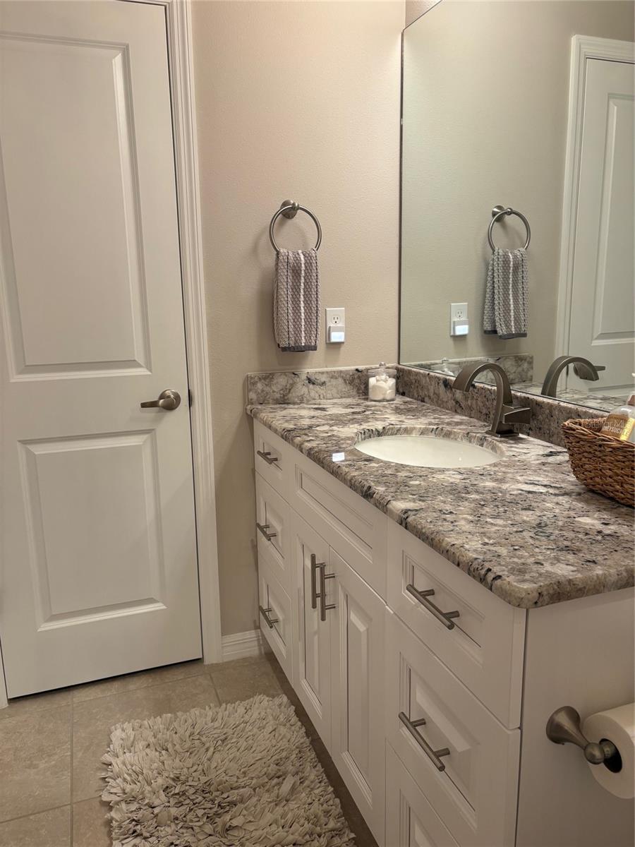 Large vanity with drawers and linen closet