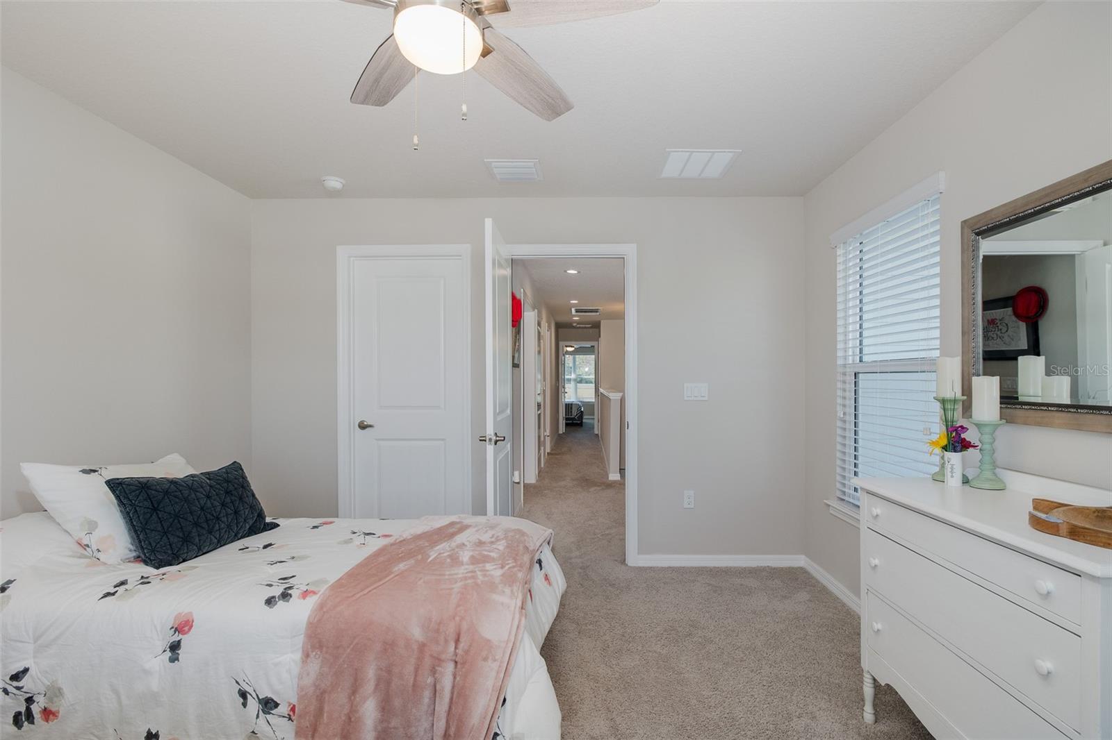 Third bedroom looking out toward loft and stairs
