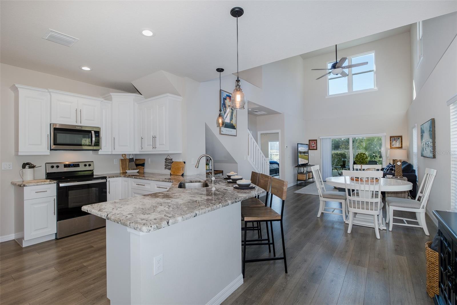 Open kitchen with dining as you enter front door
