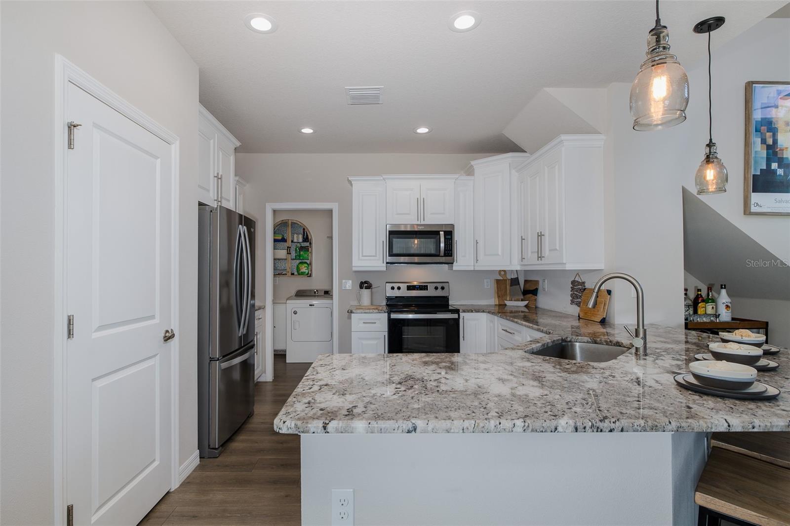 Kitchen with large island and pantry