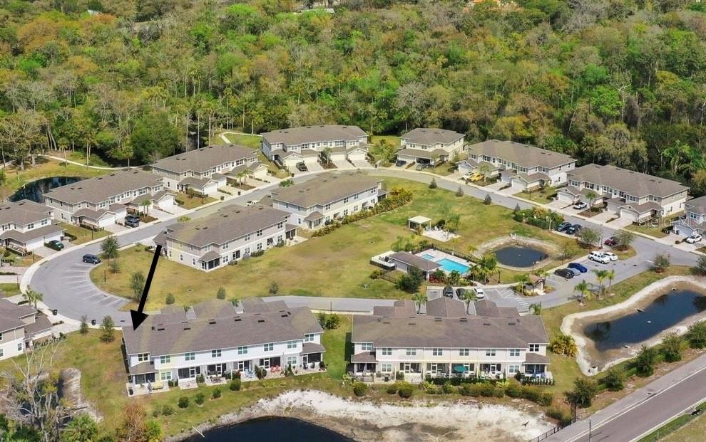 Arrow designates the location of the home