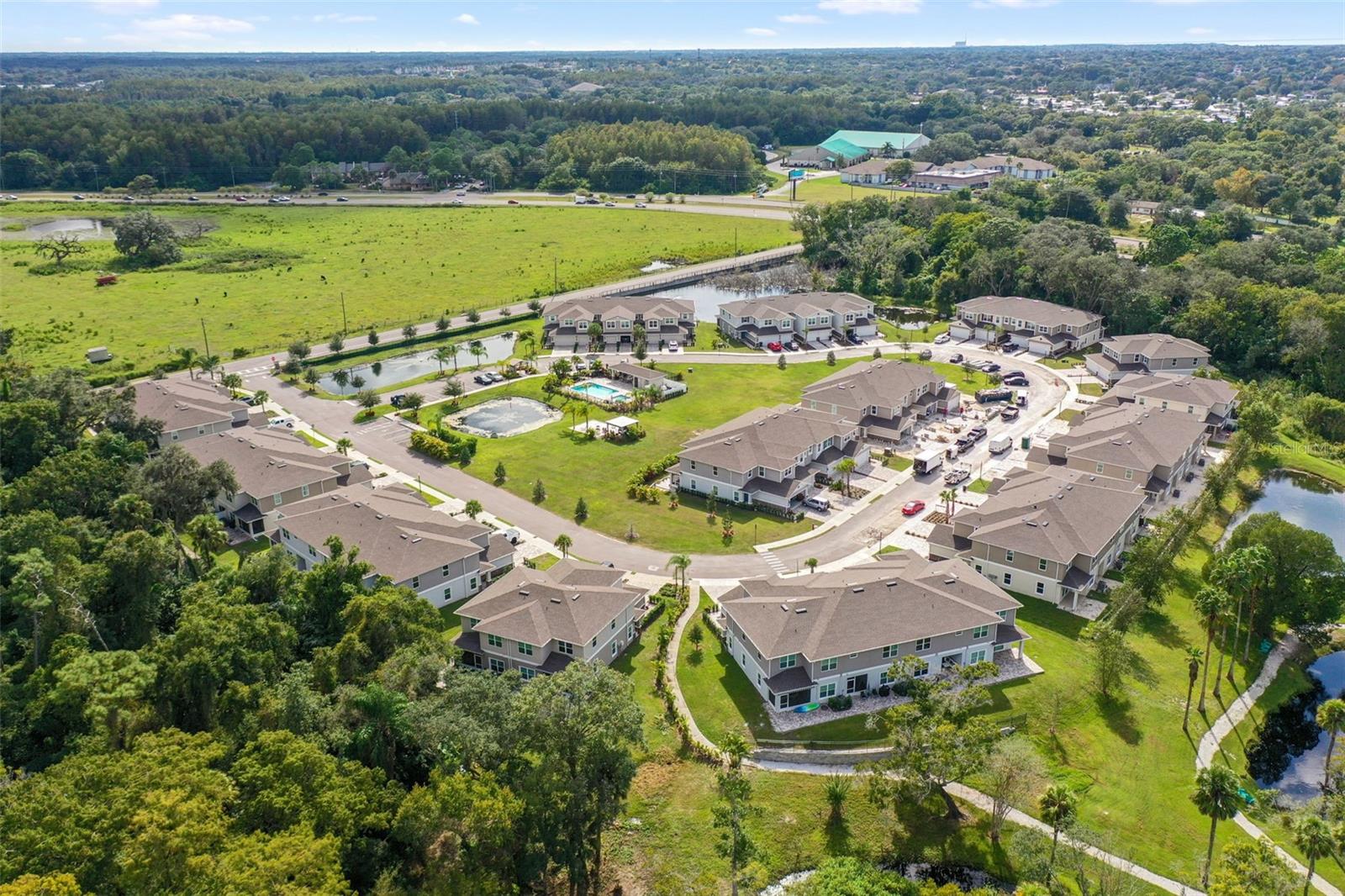 Riverwalk Preserve is a 54-unit community bordering the Cotee River, wooded preserve and cow fields