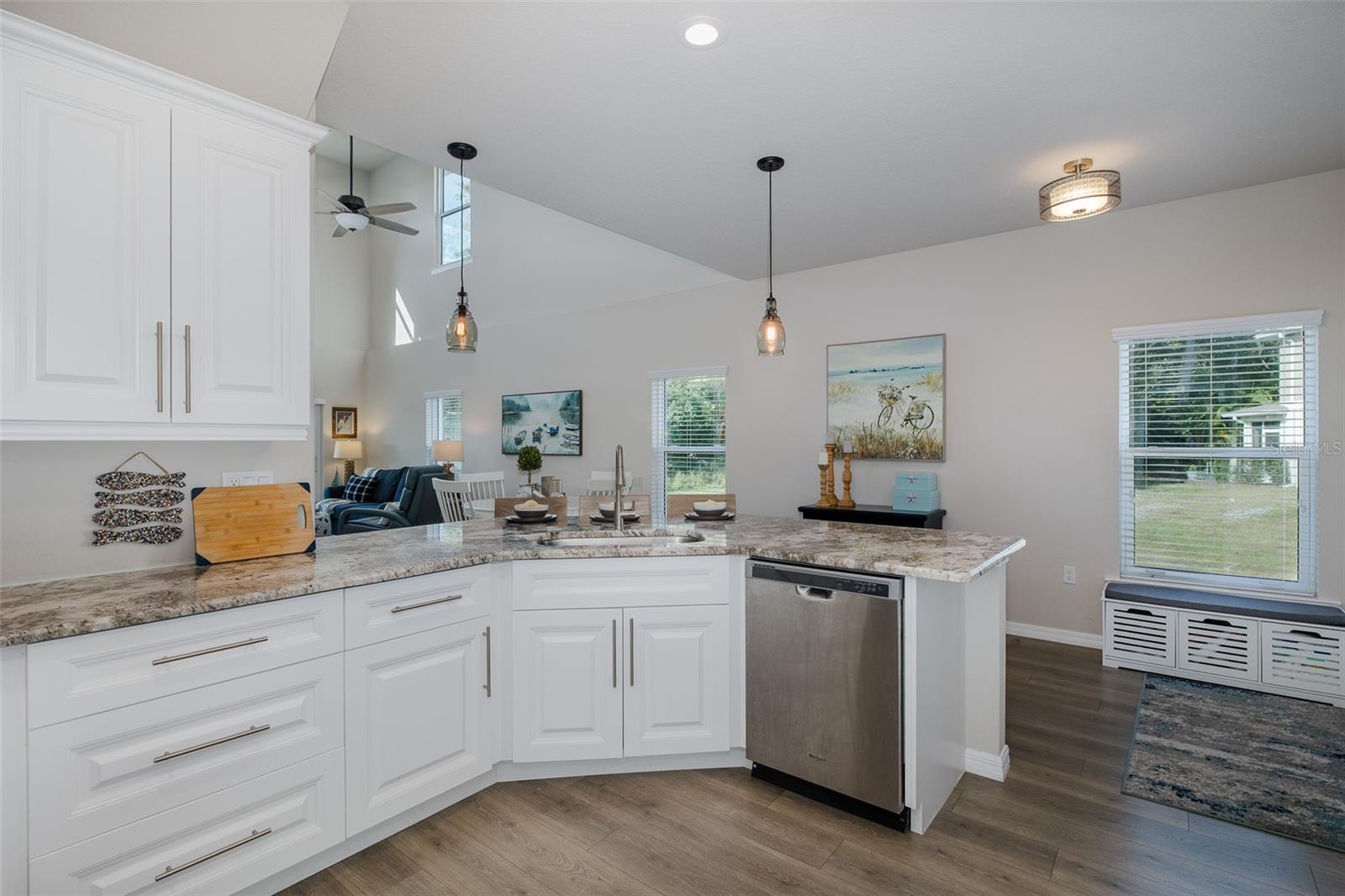 Lots of solid wood cabinets and beautiful granite countertops