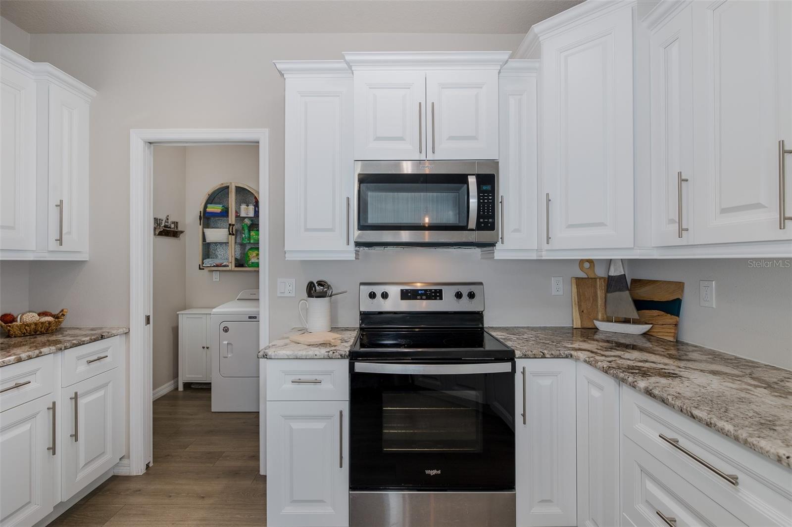 Kitchen looking into laundry room