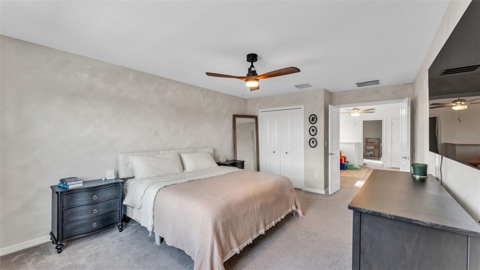 Oversized Primary with Limewash Accent Wall Detail