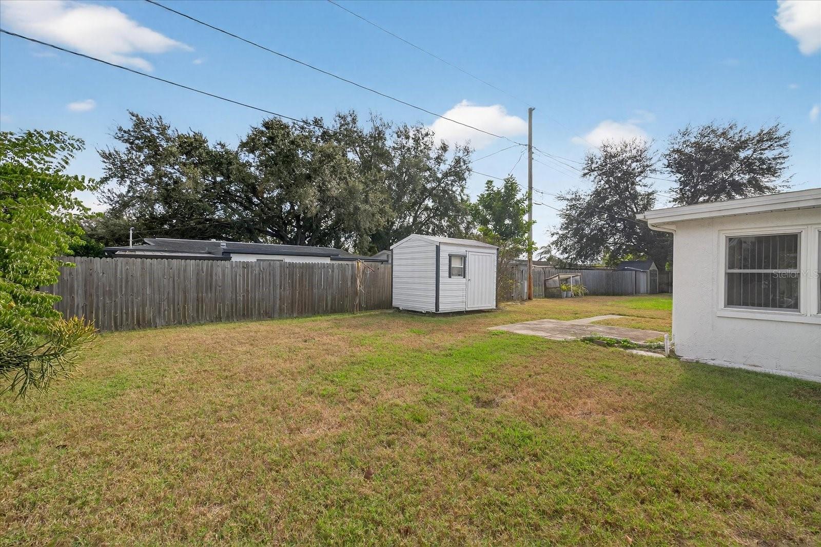 Backyard view of storage shed