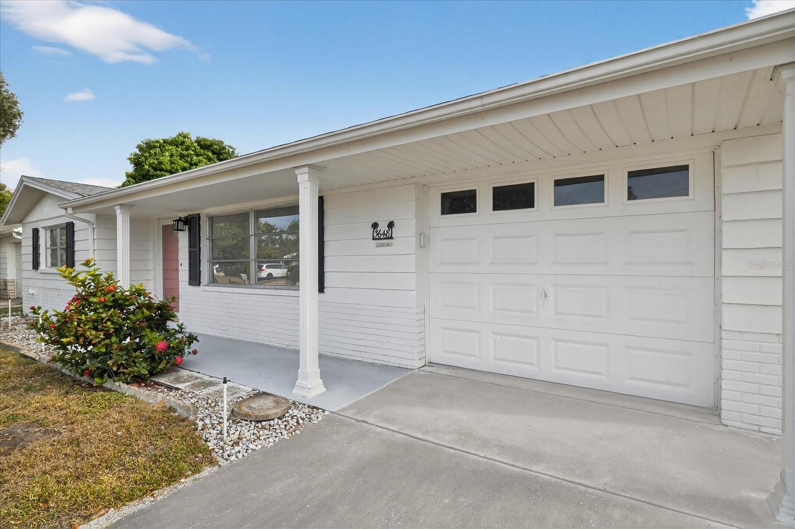 Garage entry and walkway to front door