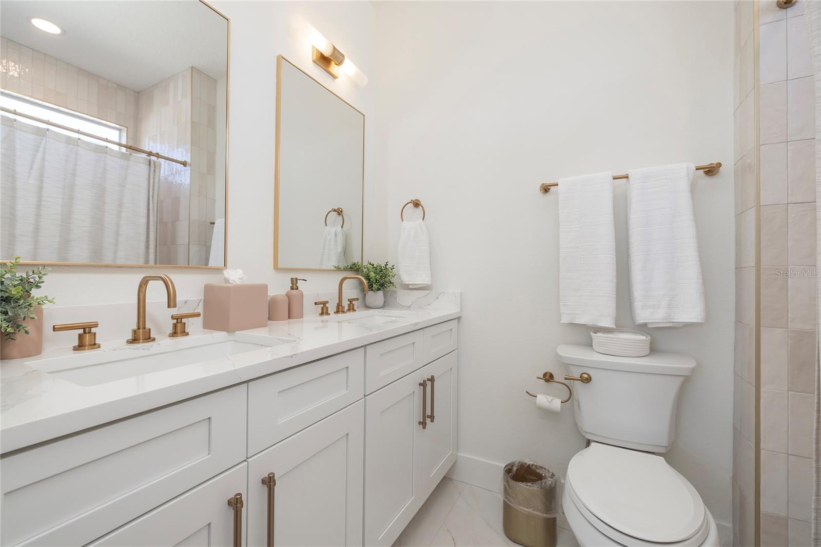 Second Bedroom's en-suite Bathroom with dual sinks