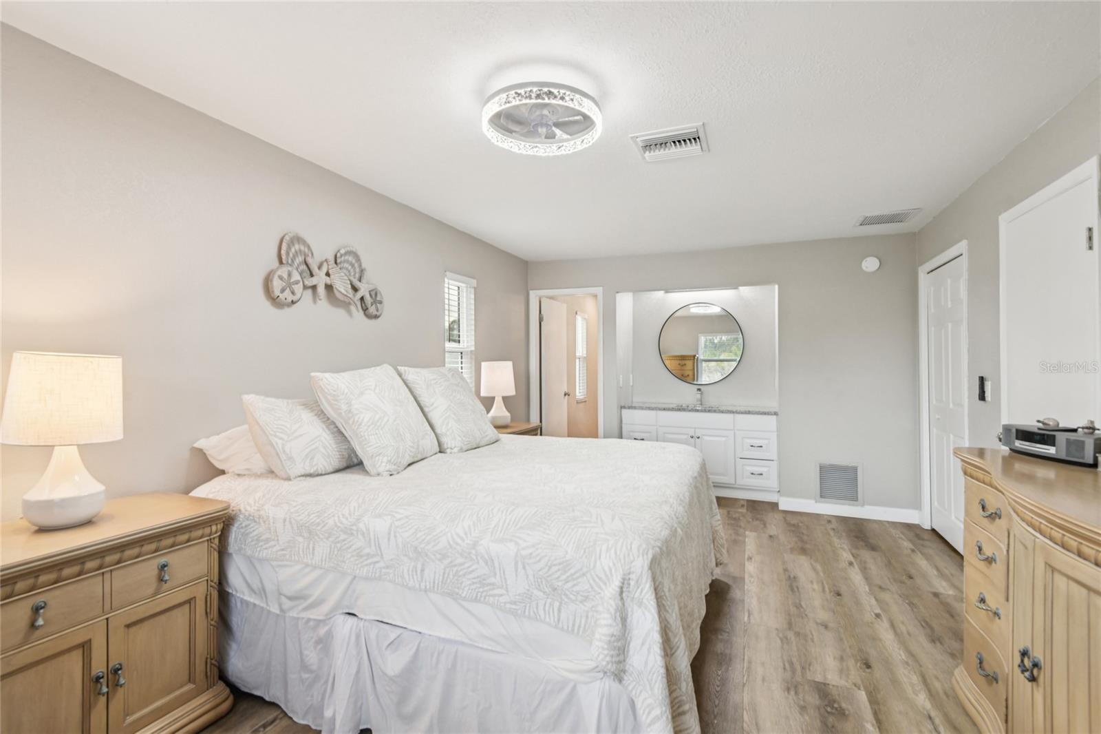 Primary bedroom with separate vanity