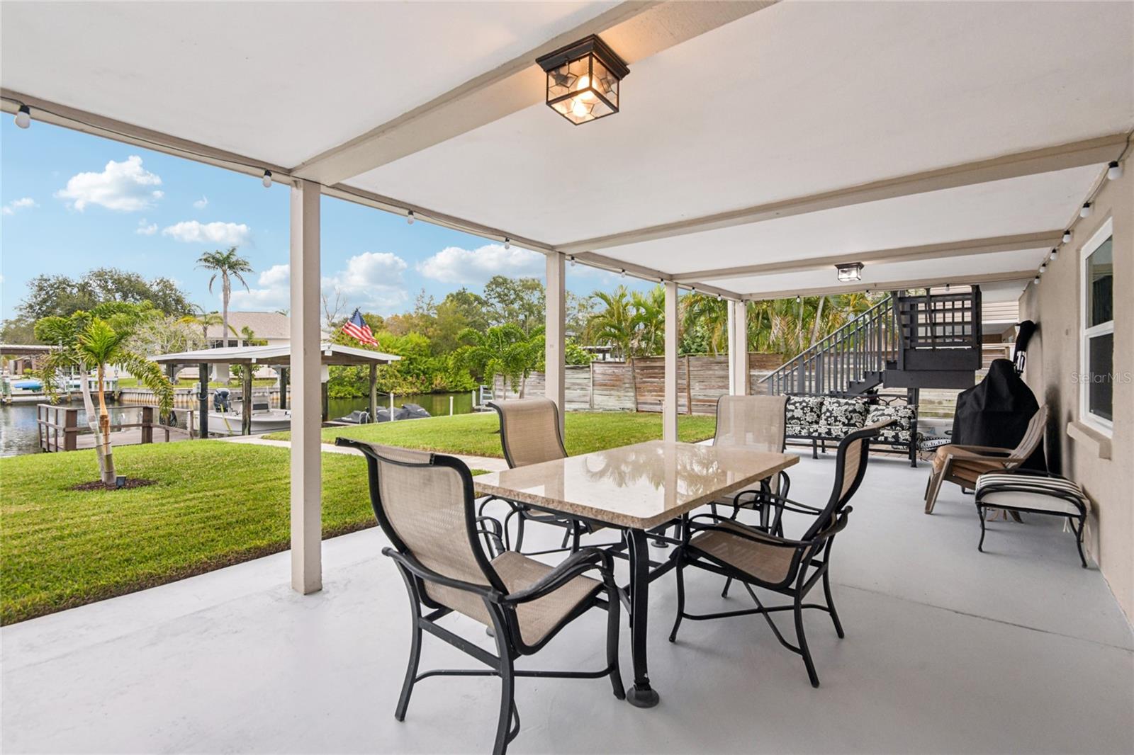 Covered patio area on first floor - great for outdoor dining and entertaining