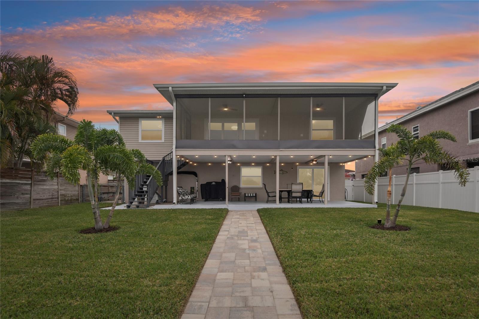 String lights on the covered patio create a relaxing ambience