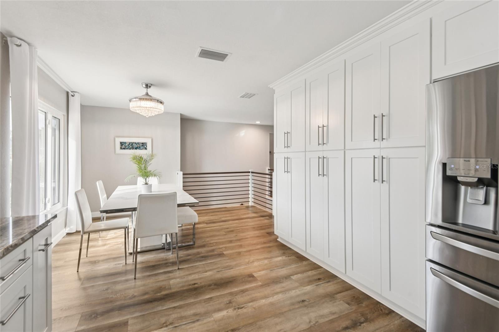 Floor-to-wall cabinetry for ample storage