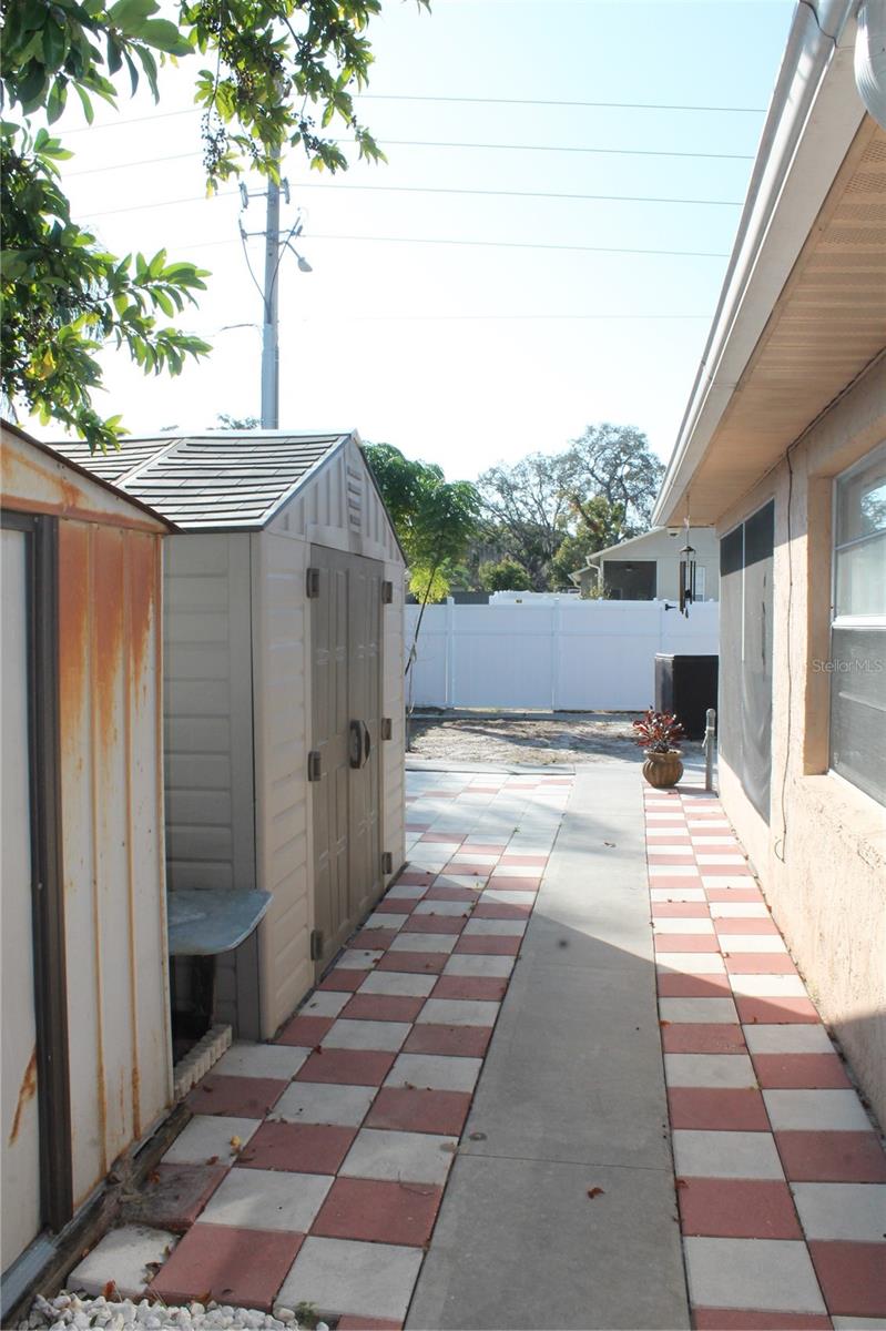 Back Patio with two sheds