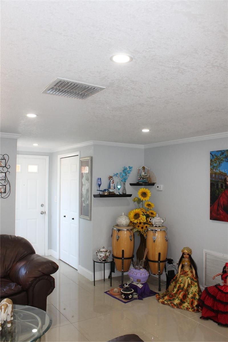 Livingroom front Door and Coat Closet