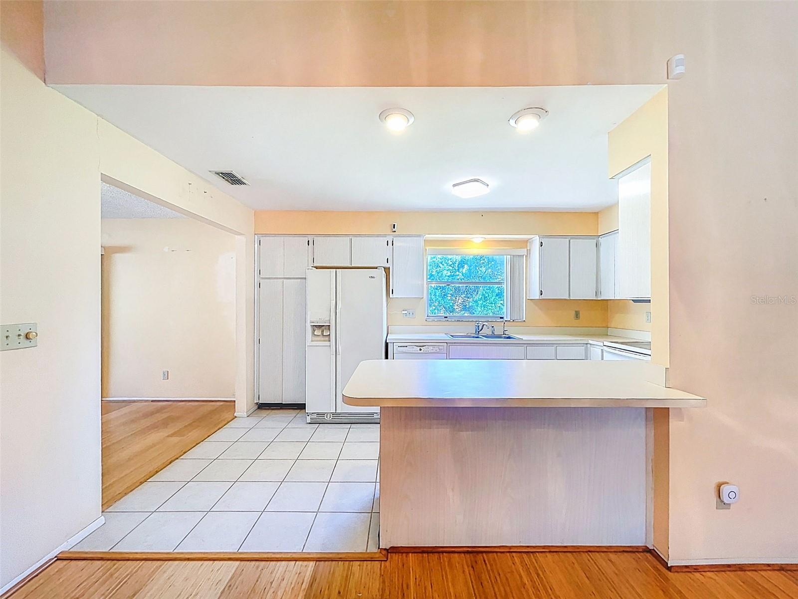 Kitchen opens to the living room