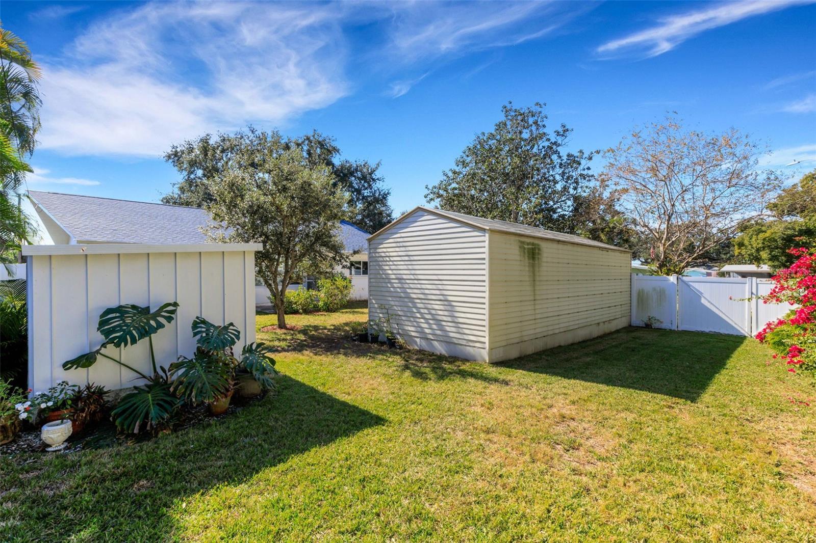 the back side of the sheds, the gate for access and your toys