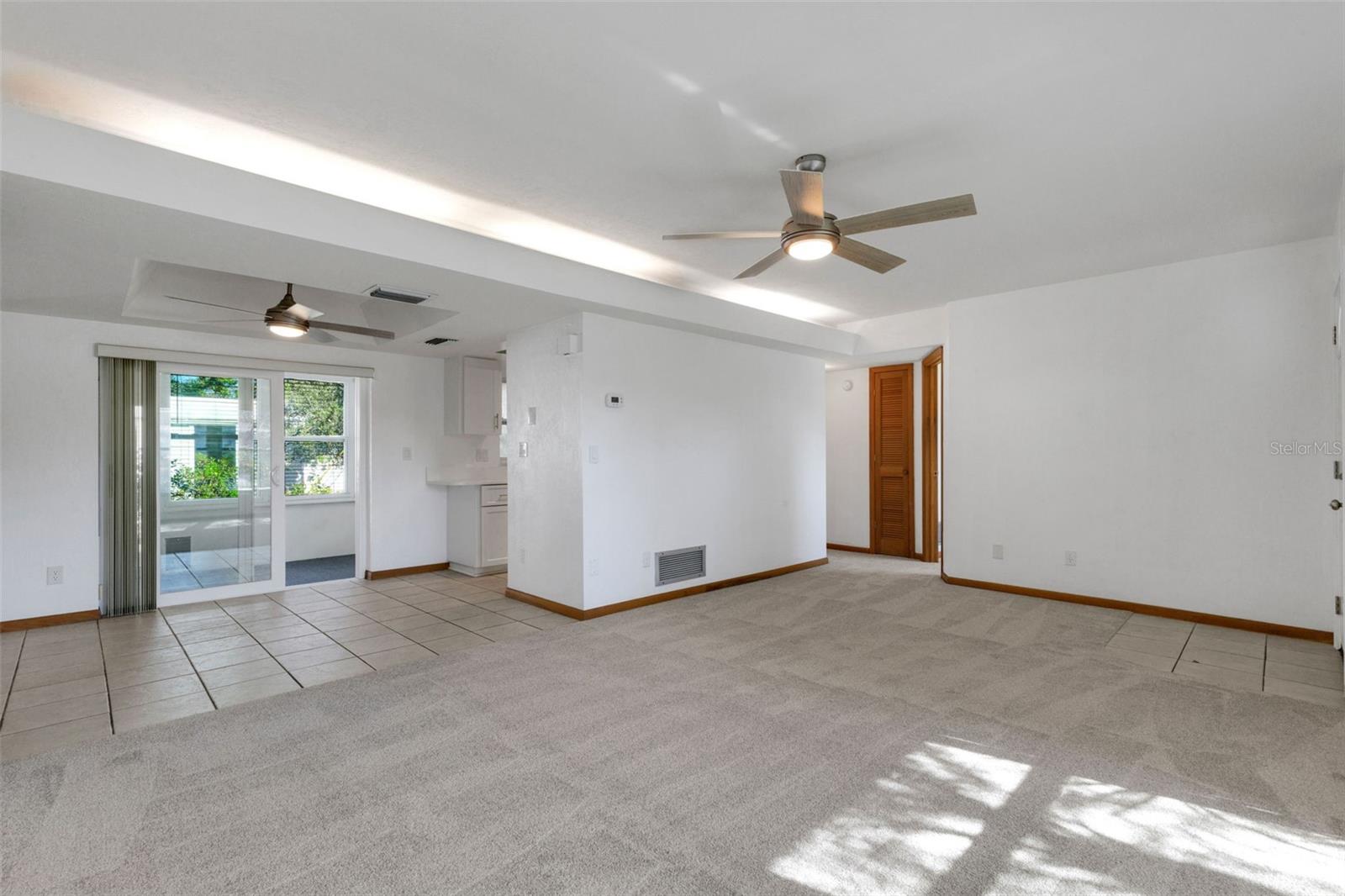 hall leads to guest bath and 2 bedrooms