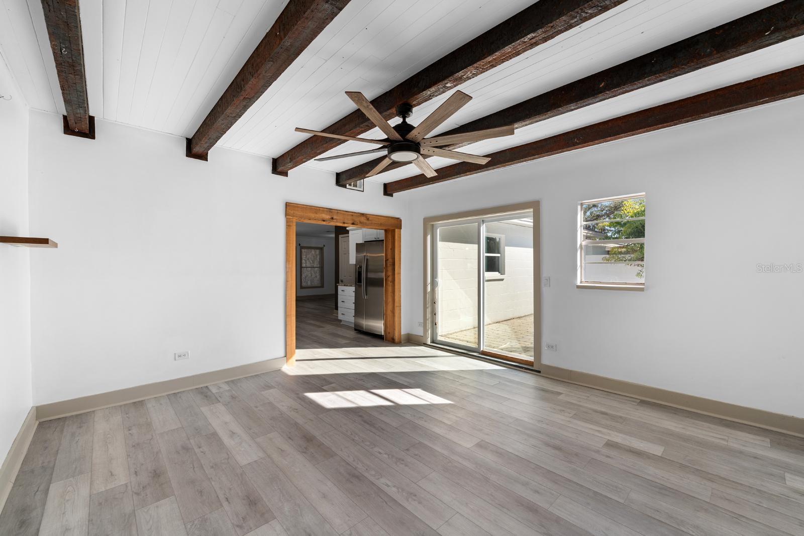 Family room overlooking sparkling pool