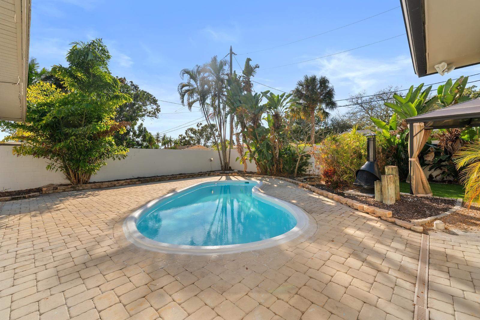 Fantastic entertaining space with pool, fireplace, gazebo and spacious deck