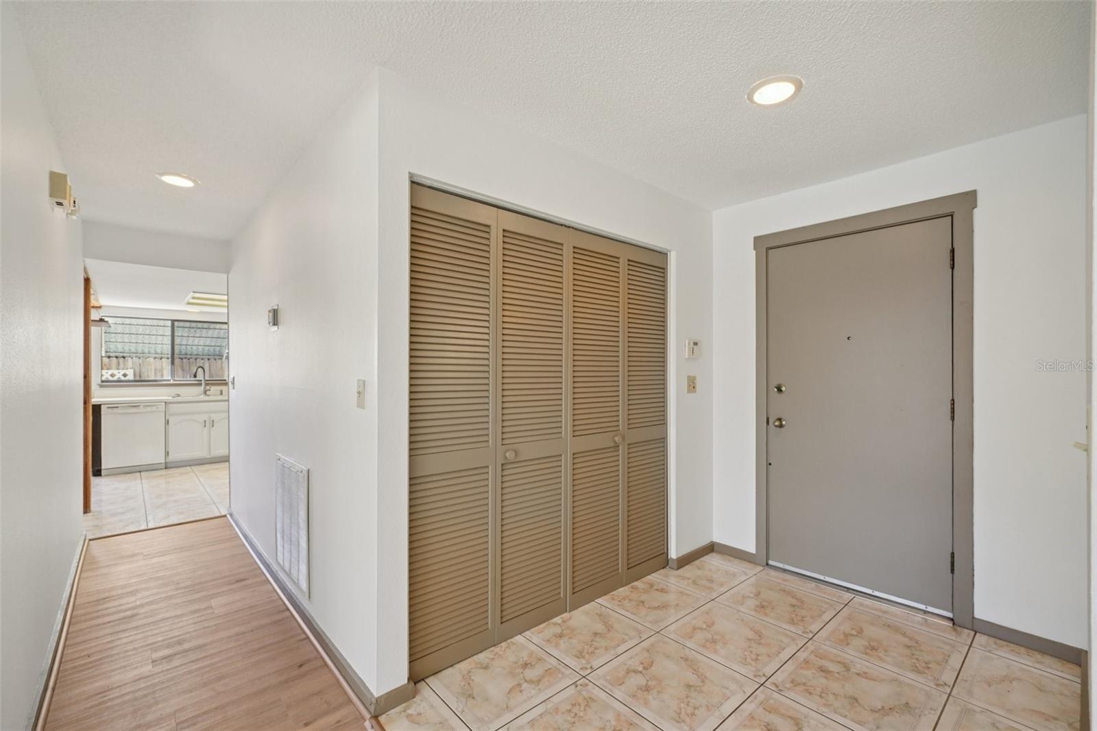 Front entry with large hall closet