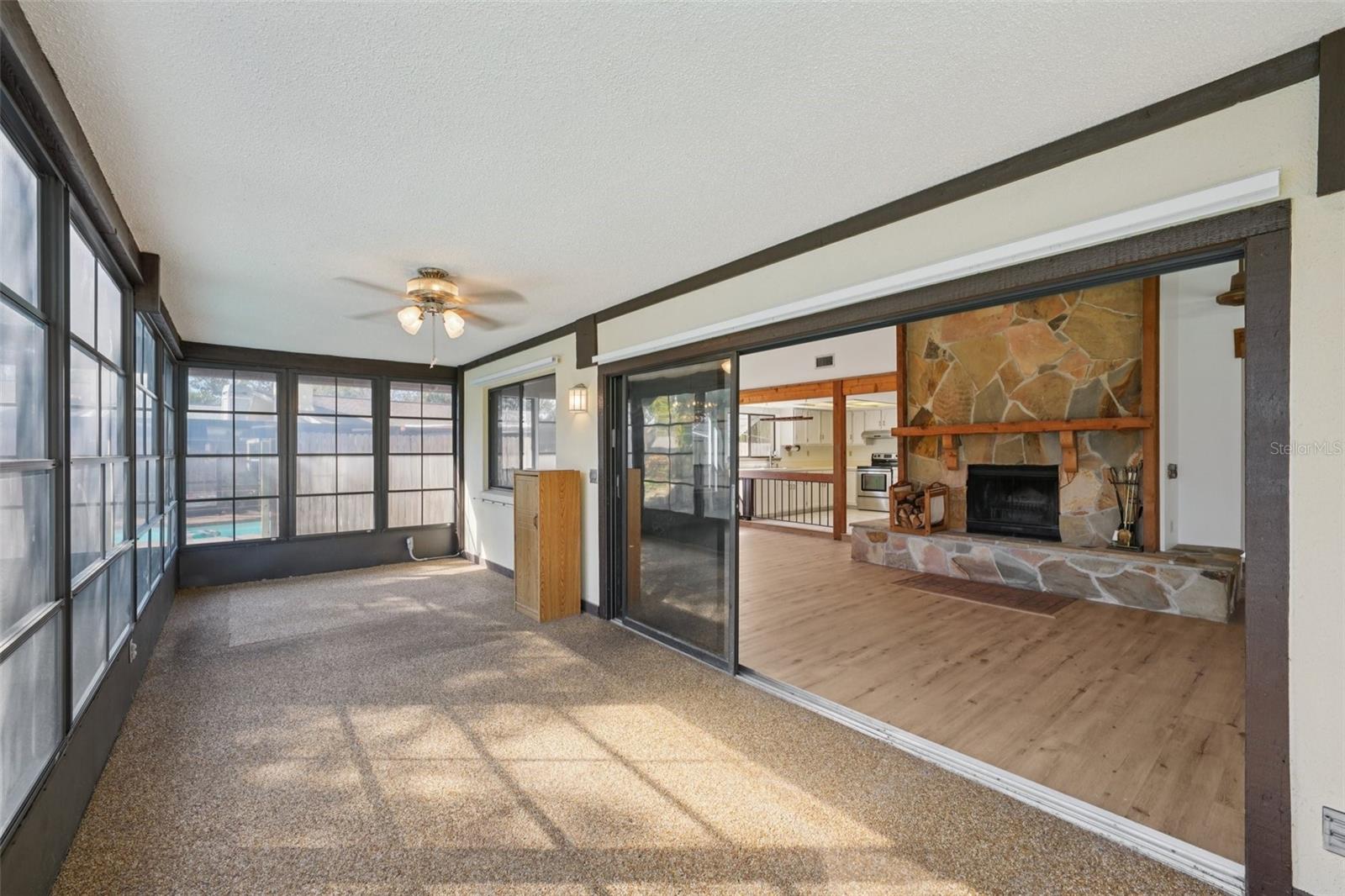 Triple sliding glass doors out to lanai