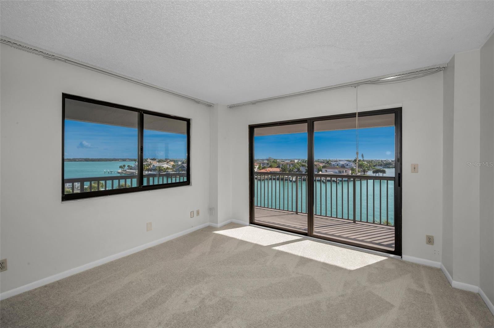 Other set of sliding glass doors in the living area exiting to the huge waterfront balcony!