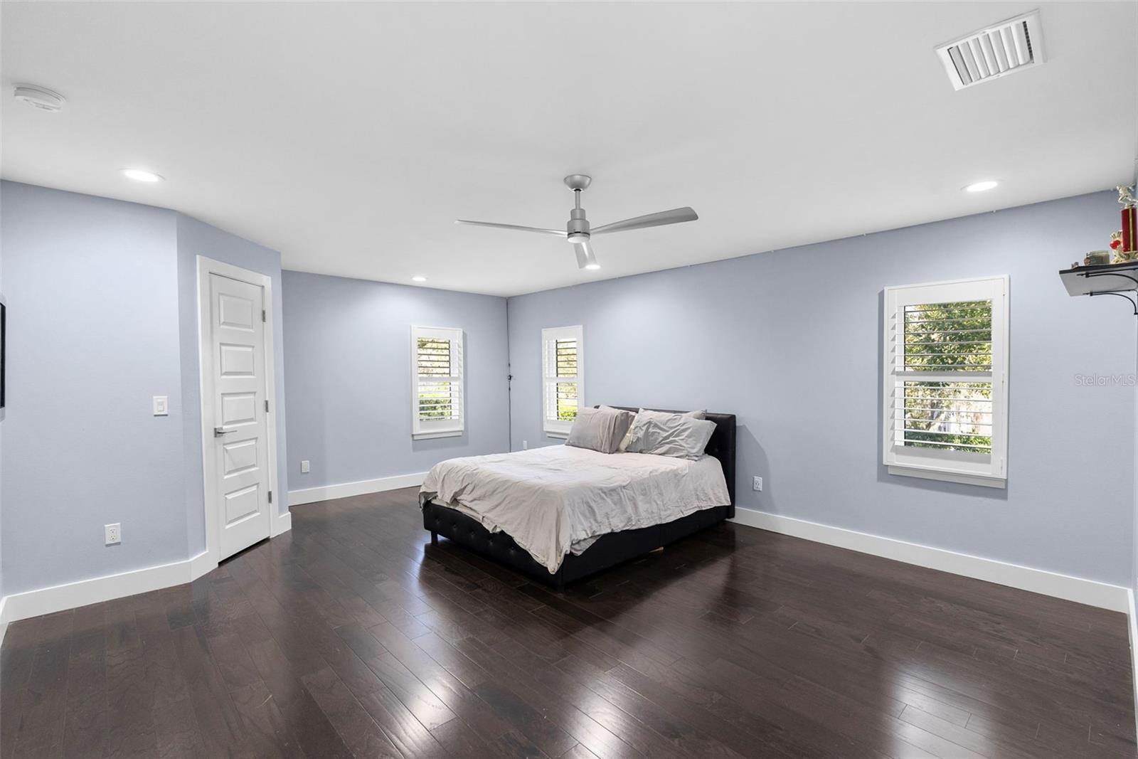 All bedrooms have wood floors and plantation shutters