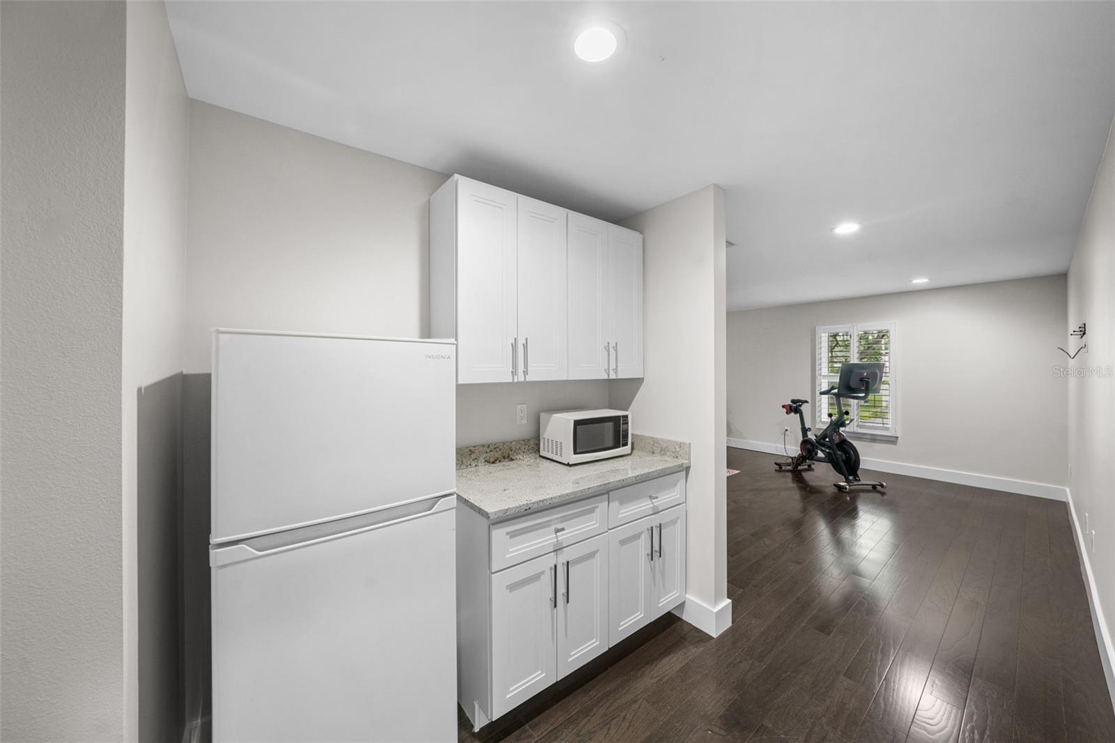 It also has a kitchenette that leads to the guest suite