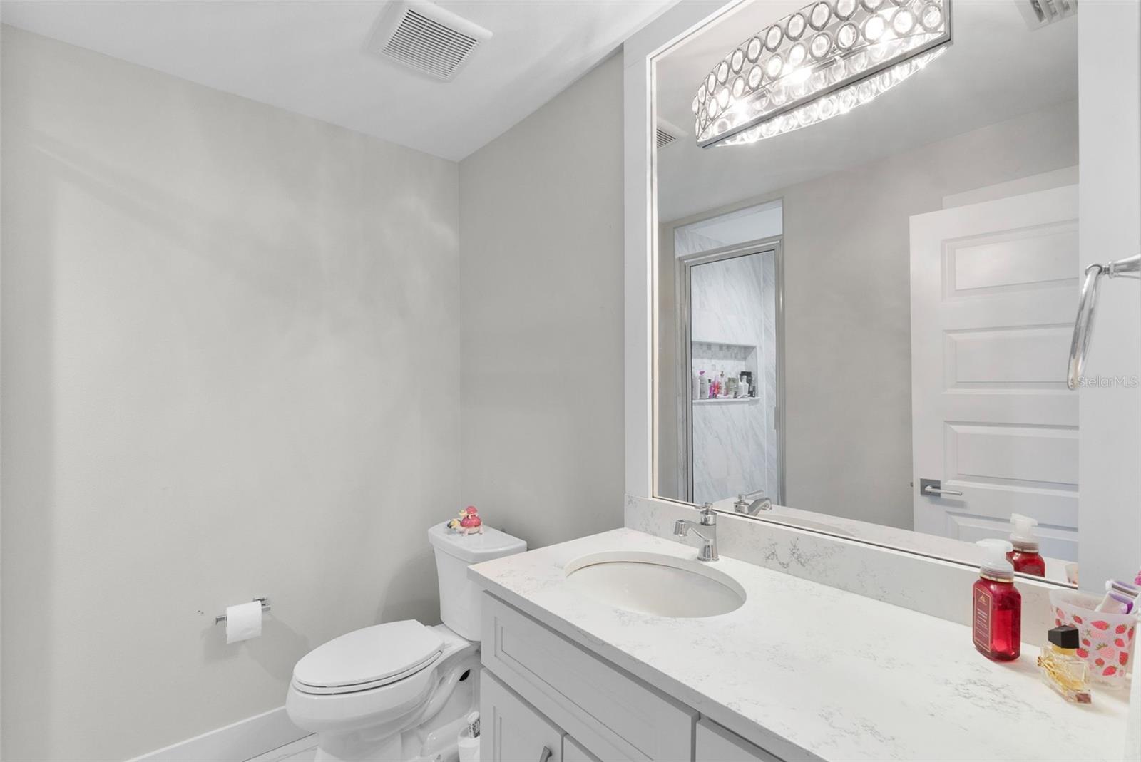 It has its own bath and separate entry off garage