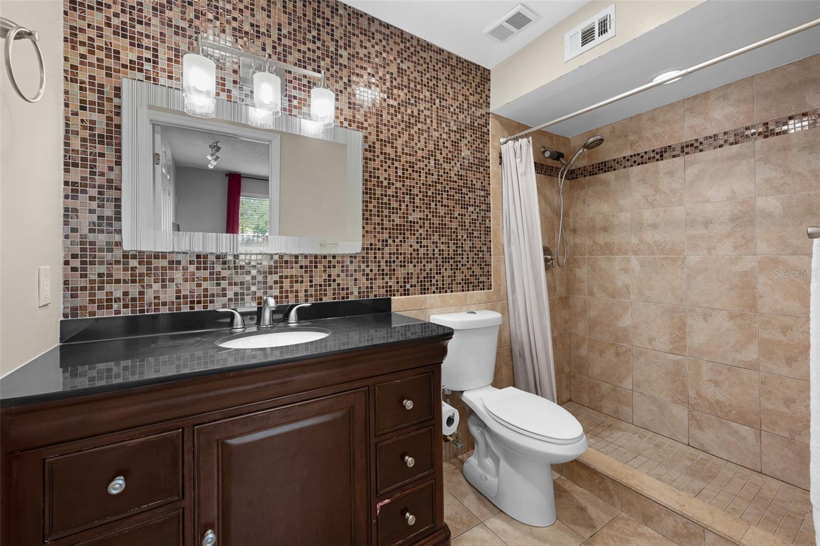 En-suite Bathroom with a walking shower