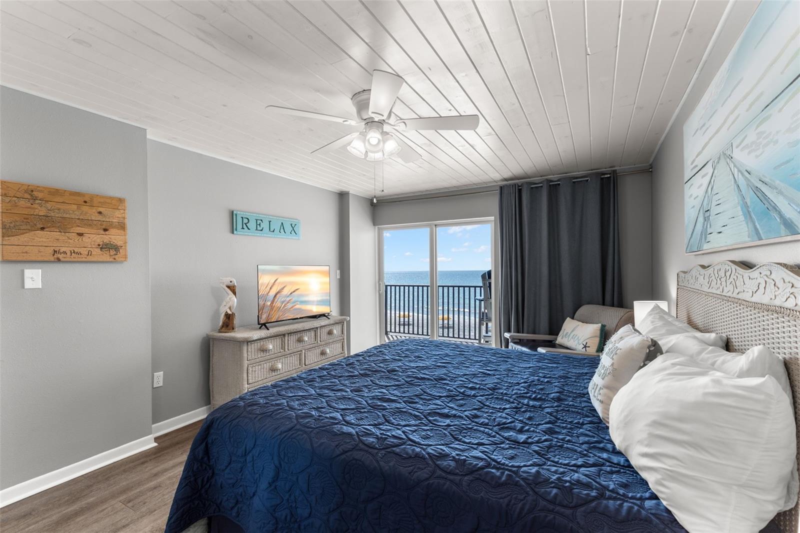 Gulf Front Primary bedroom. Sliders leading out to your furnished 25' Balcony.