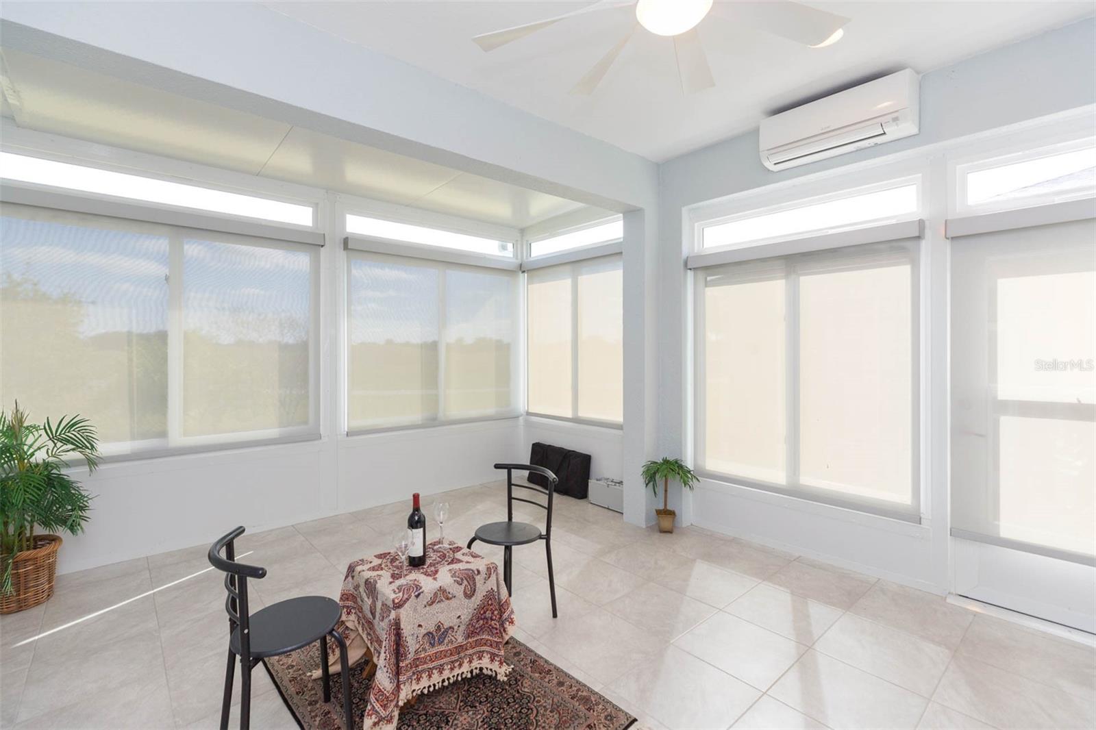 Note elecgtric shutters in Florida Room
