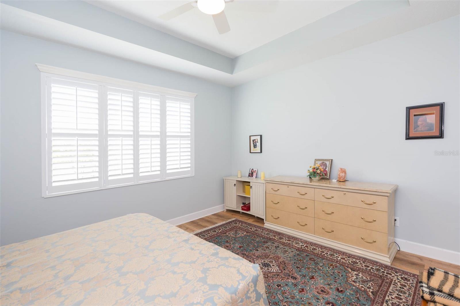 Master bedroom--note plantation shutters throughout.