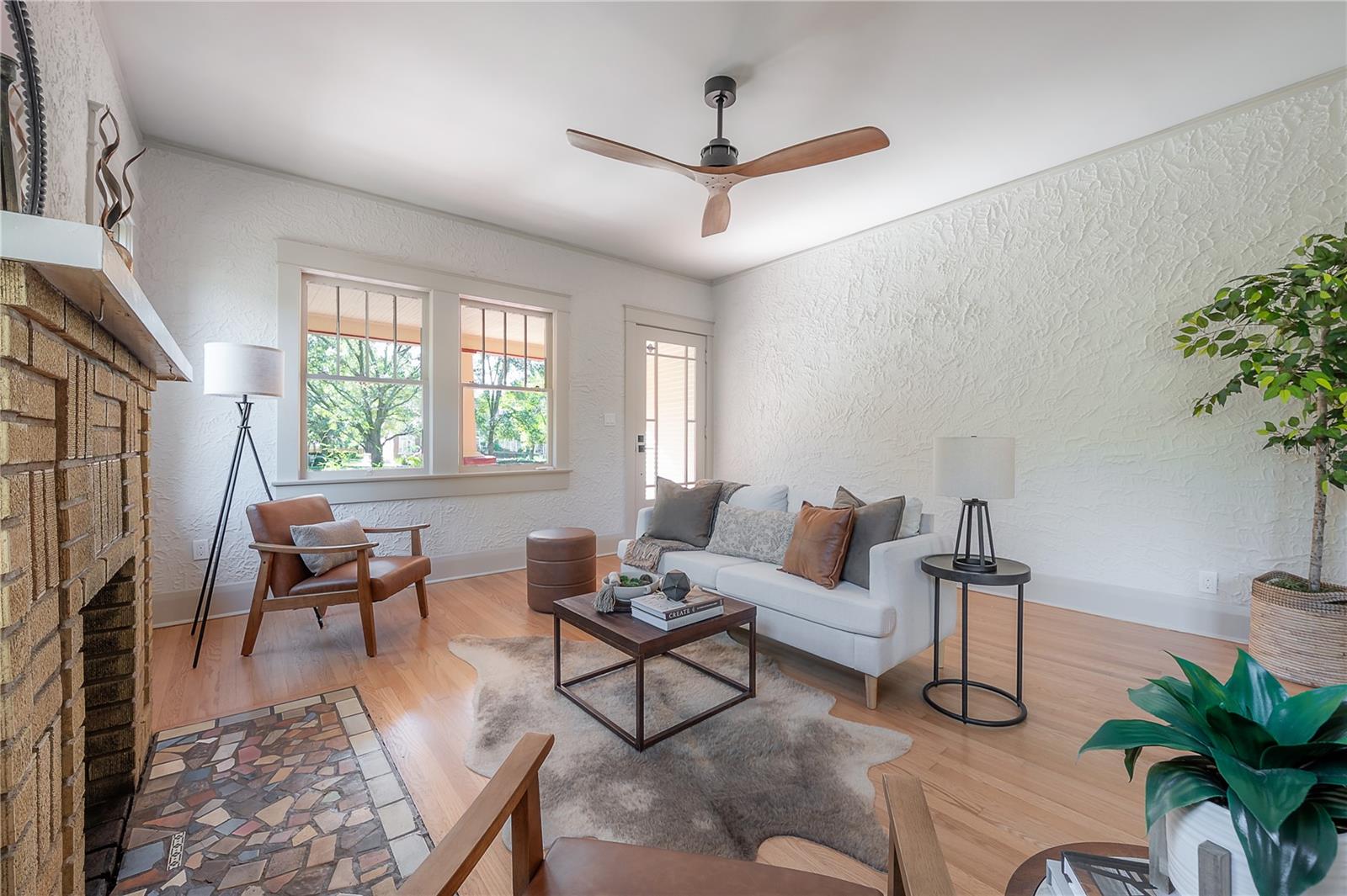 Living Room With Fireplace & Garden Views