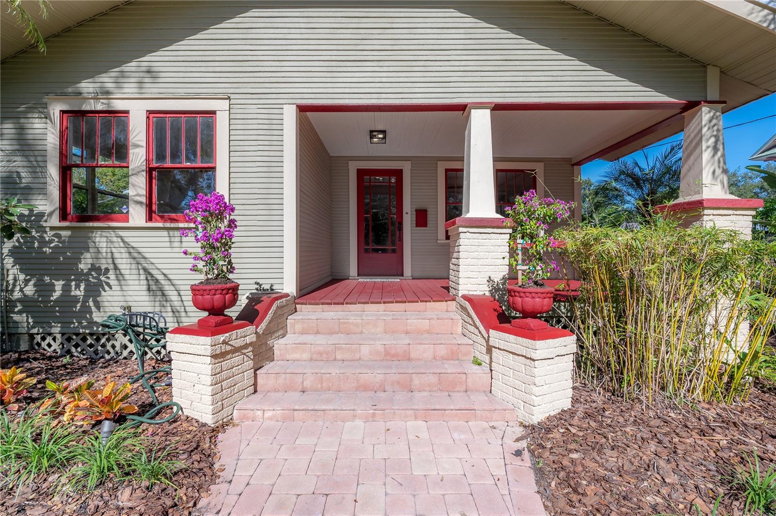 Charming brick-paver walkway leading to the welcoming front porch