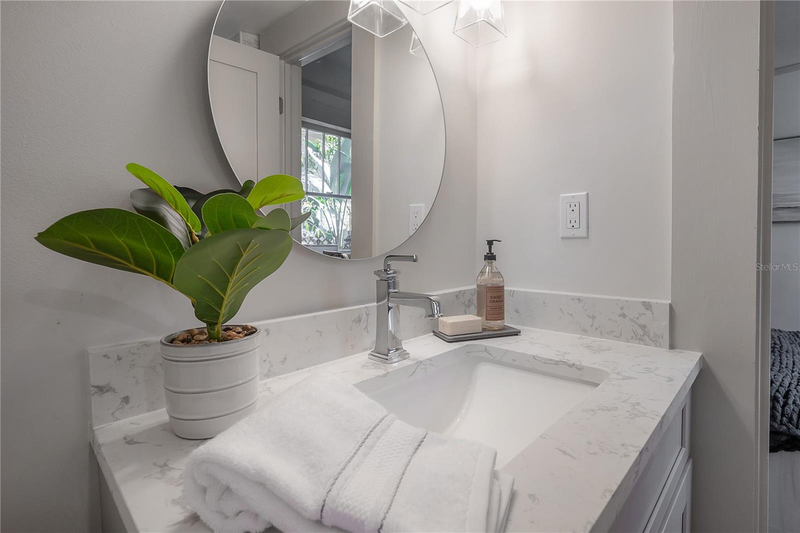 Clean, modern vanity in master bathroom