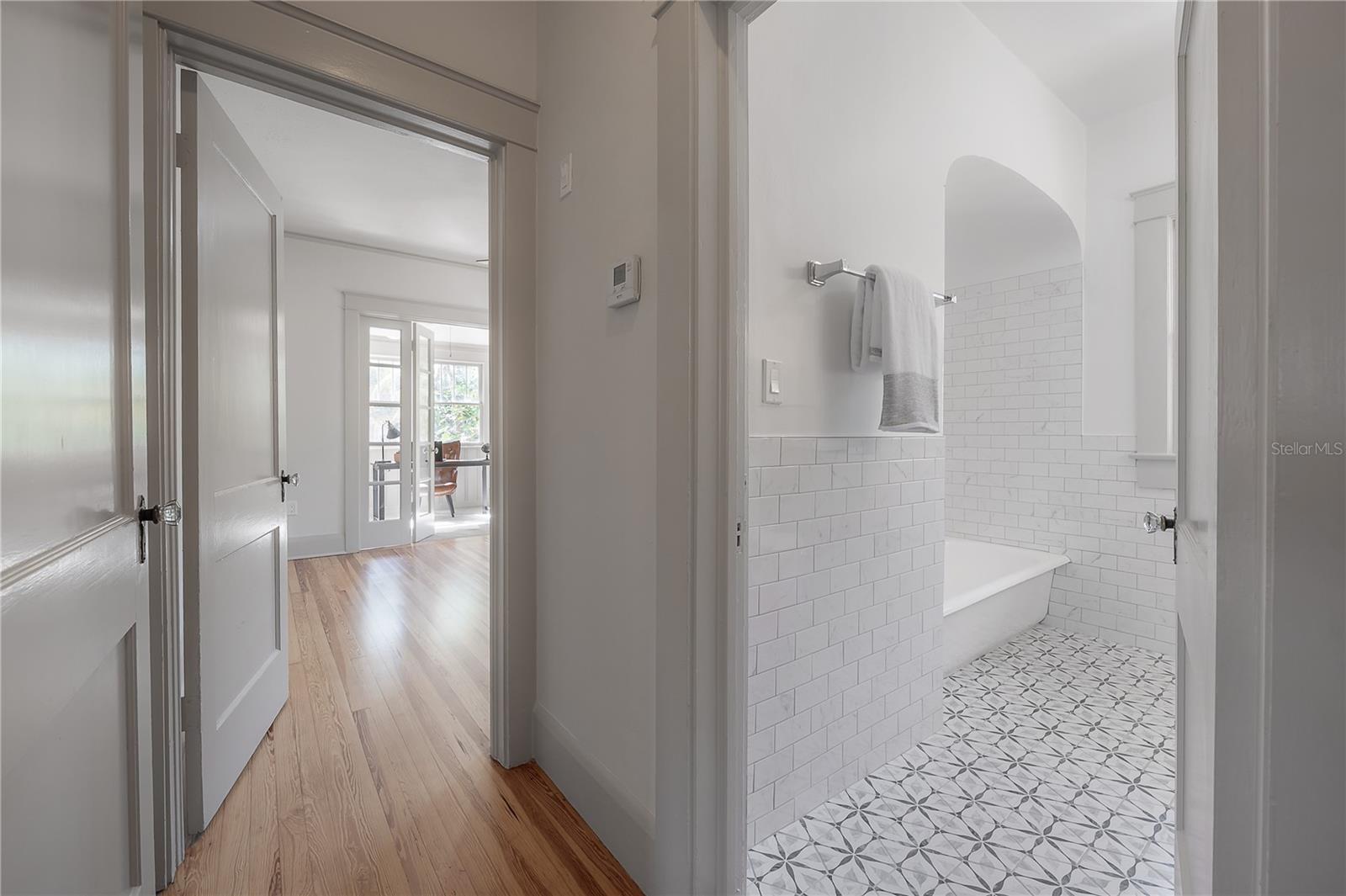 Bright hallway with freshly refinished hardwood floors
