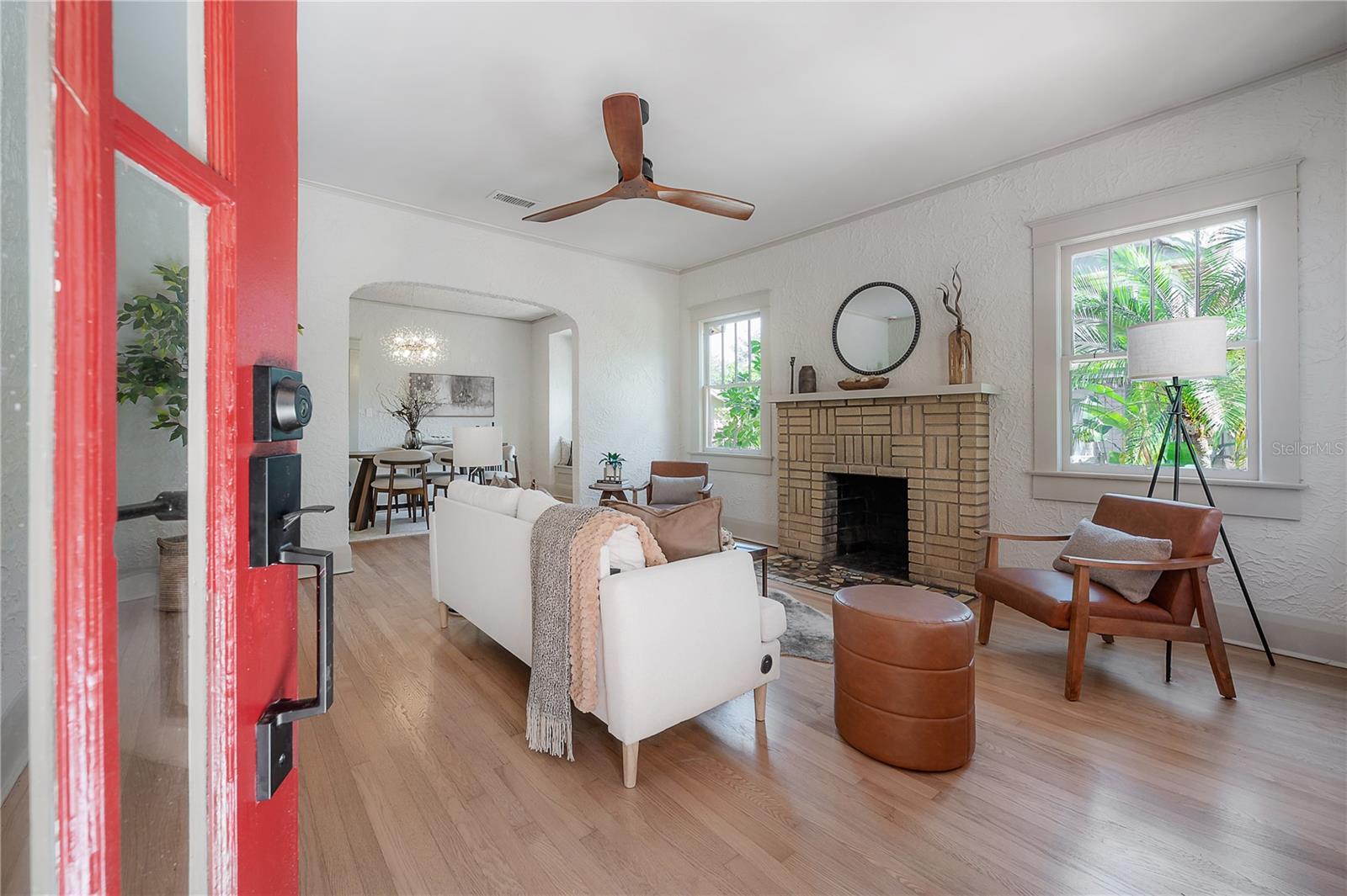 Welcoming entry opens into a bright, beautifully restored living space.