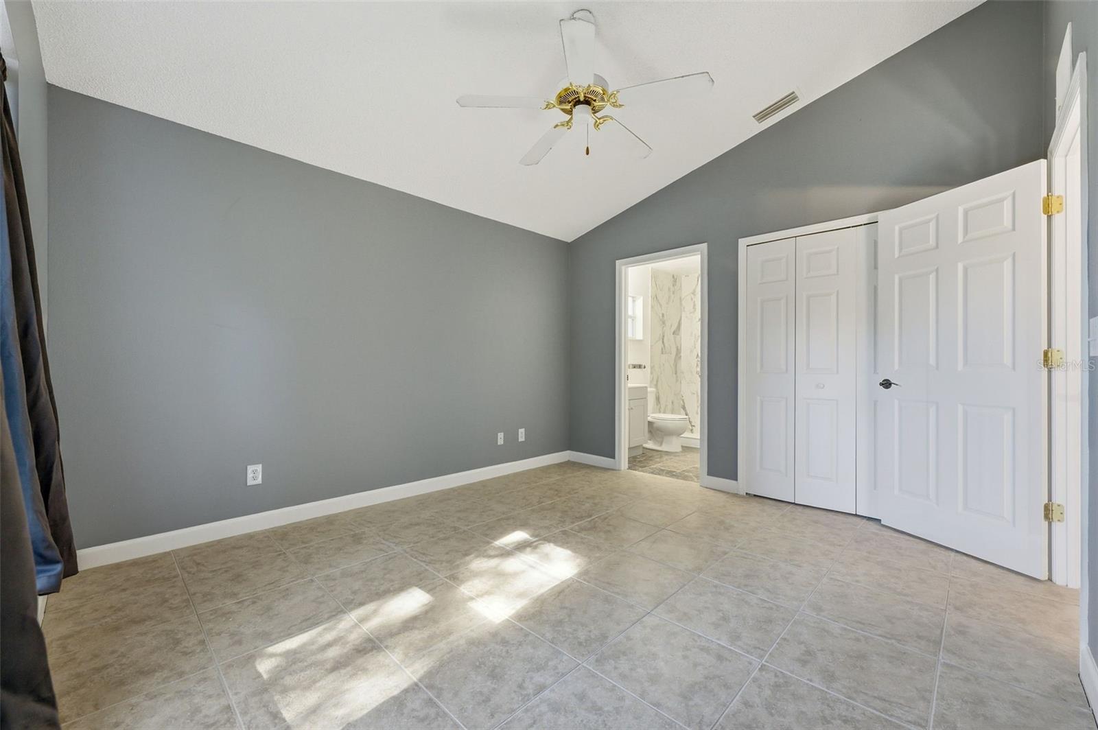 Primary bedroom facing west