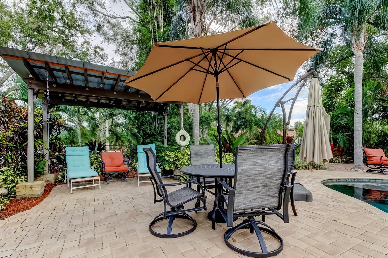 Even a pergola in the backyard for some additional shade.