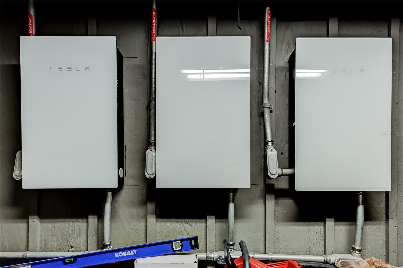 These are the Tesla Batteries that charge from the Tesla Solar Roof.